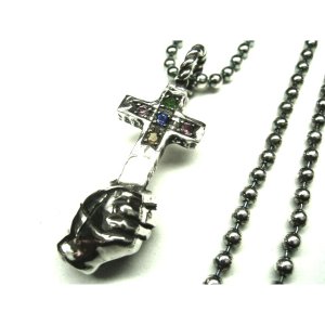 GRASPING CROSS NECKLACE