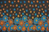 アフリカンプリント布 キテンゲ 15『降り積もる花』（黒×オレンジ）布 縦約105cm、横長さ1m単位で販売