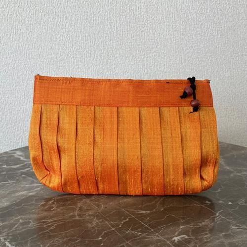 ラオス少数民族手紡ぎ葛繊維のメッシュバッグツートンオレンジとポーチ