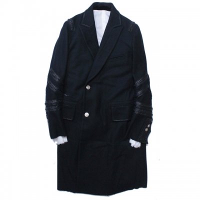 double breasted peaked lapel chesterfield coat.