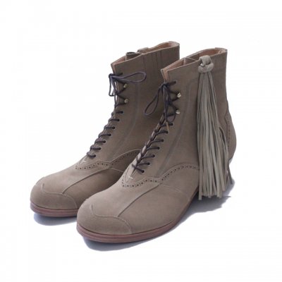 western cut boots w/fringe. -sand beige.-