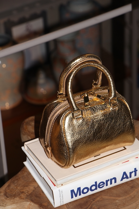 CHRISTIAN VILLA Gold mini bag