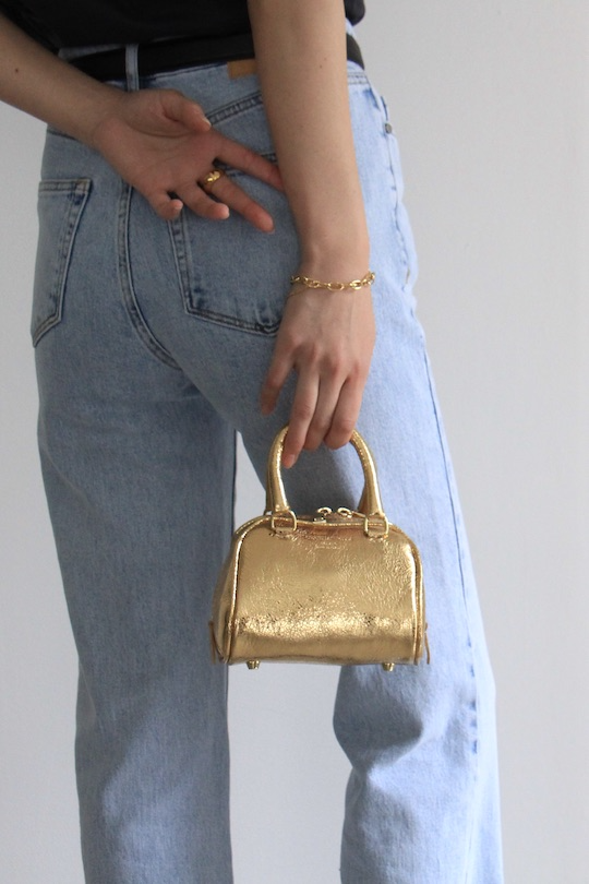 CHRISTIAN VILLA Gold mini bag