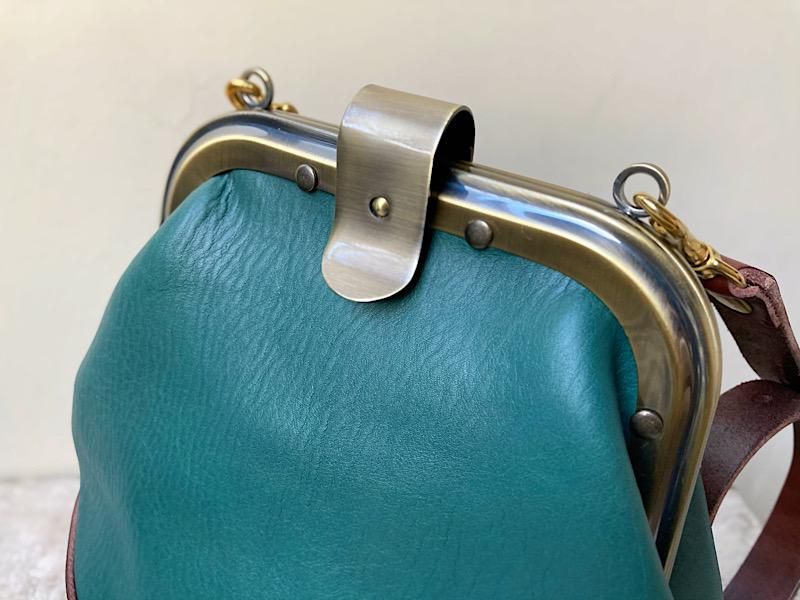 イタリアンレザー×栃木レザーのがまぐちミニリュック（ターコイズ