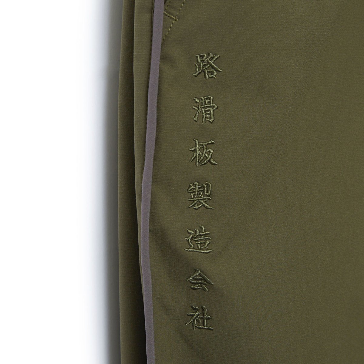 INDEPENDENT x EVISEN PIPING PANTS GREEN | www.omniblonde.com