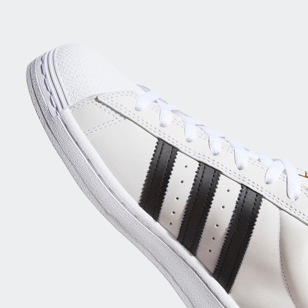 Adidas superstar hotsell white black stripes